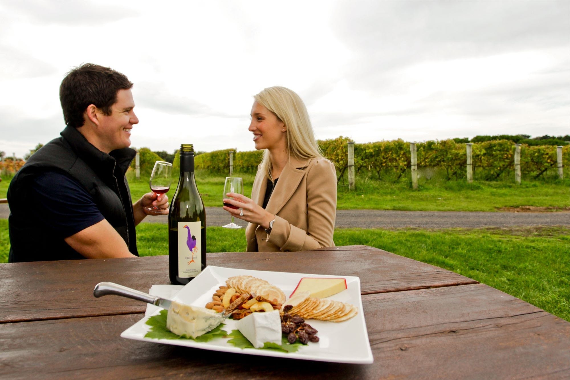 Purple Hen tasting outside couple