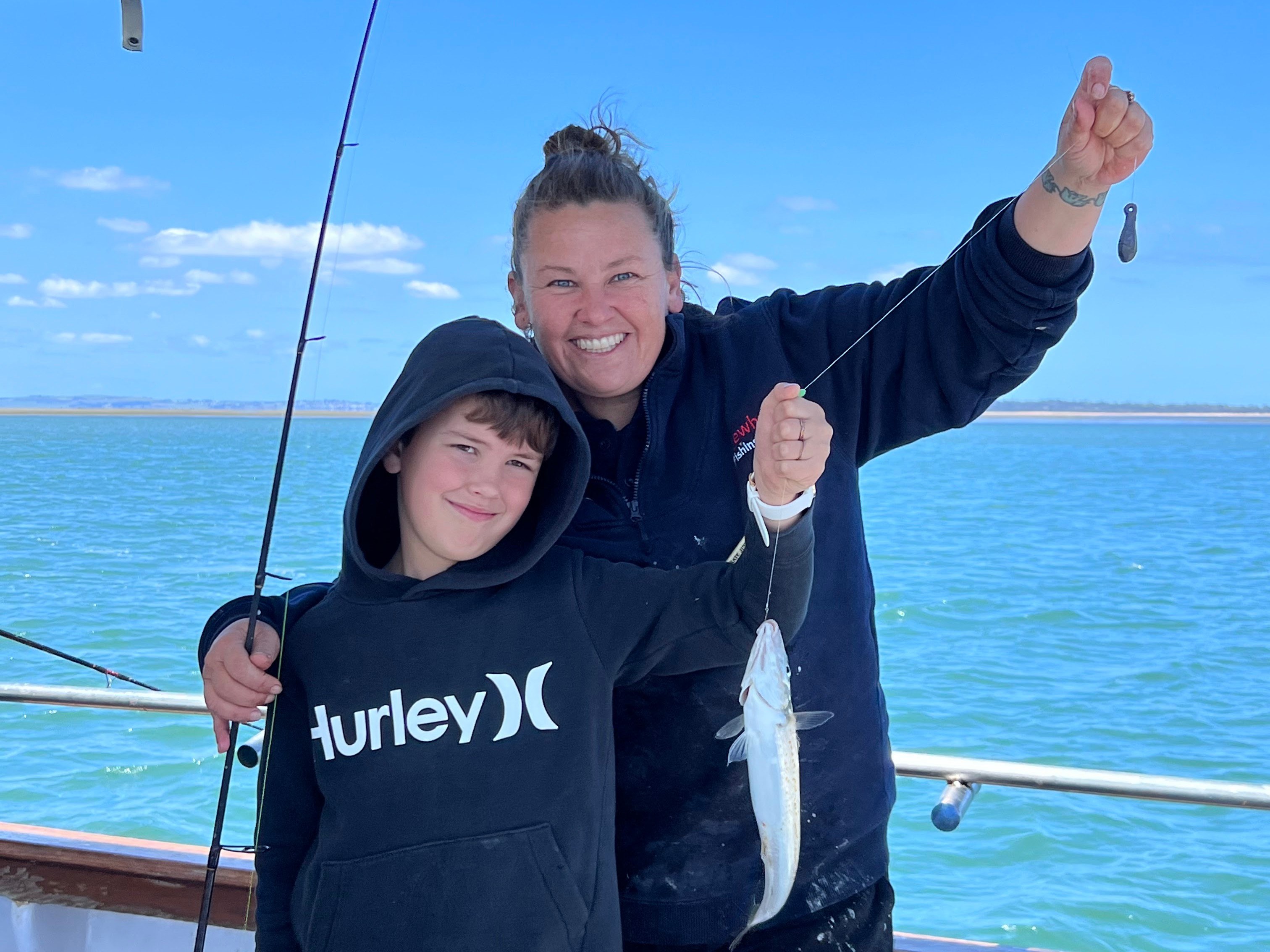 Mum and son fishing