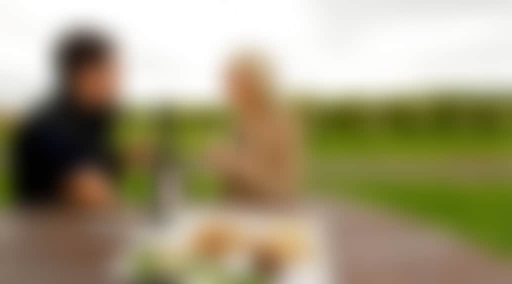 Purple Hen tasting outside couple